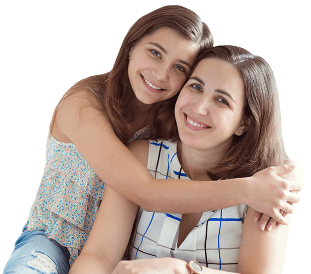 Teen girl hugging her mother