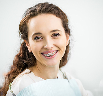 a young patient in Randolph with braces 