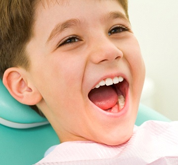 Young boy at dentist for dental sealants in Randolph.
