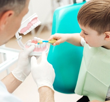 Young boy at preventive dental appointment. 