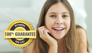 Smiling young woman with braces