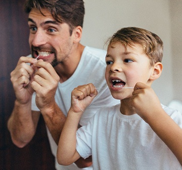 Child in white shirt biting their nails