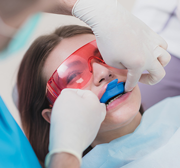 Patient receiving fluoride treatment