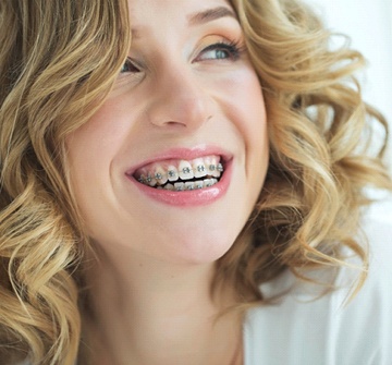 Smiling girl with traditional braces in Randolph