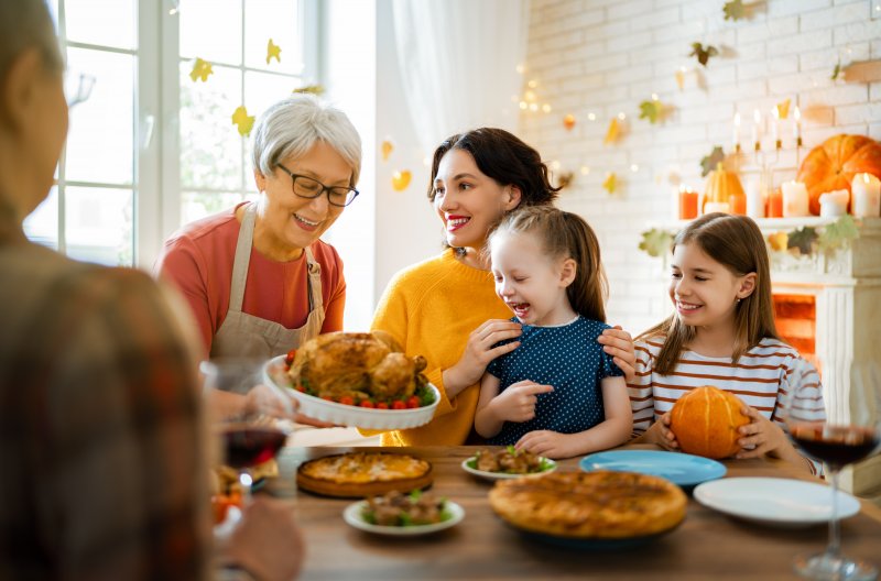 Family enjoying Thanksgiving meal together