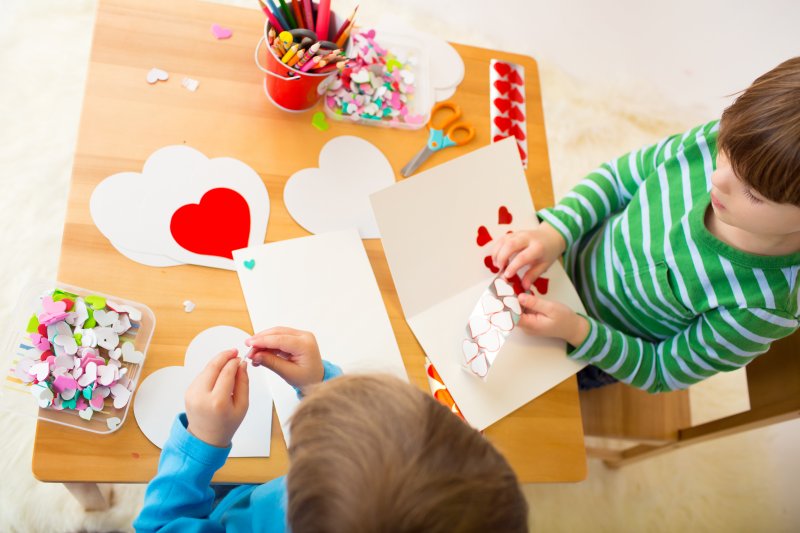 Aerial view of kids making Valentine's Day cards