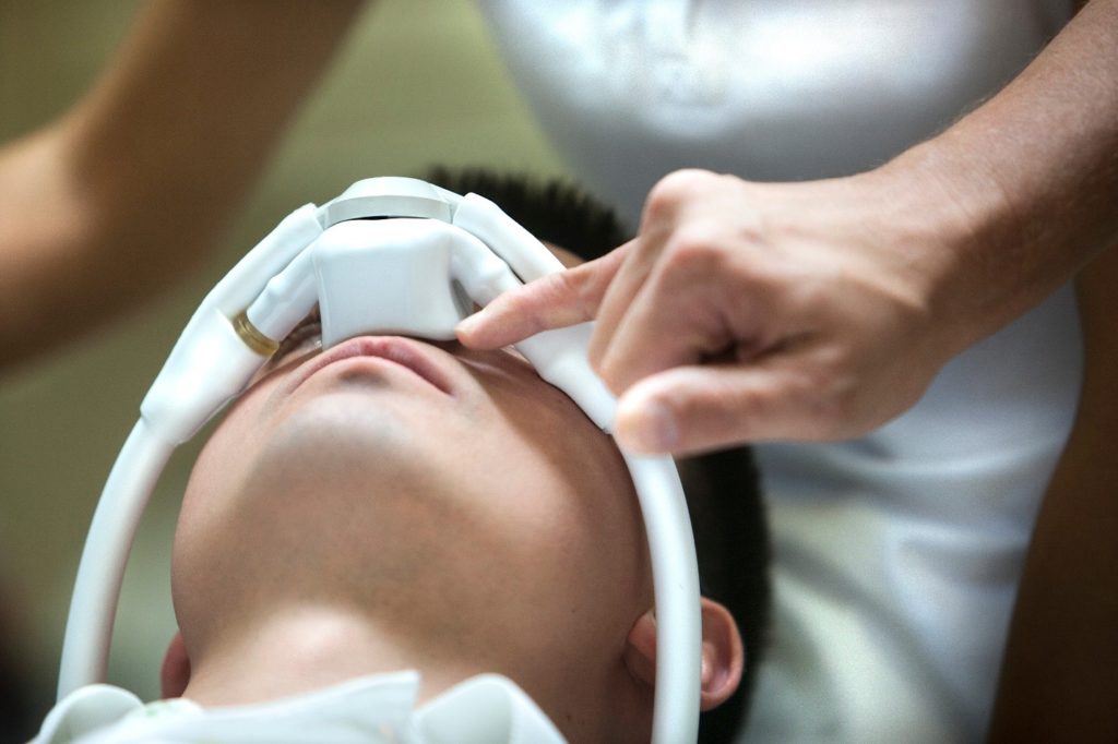 Closeup of patient getting nitrous oxide at dentist’s office