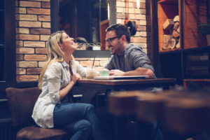 a couple smiling while on a date